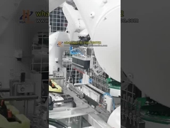 Komórka do wstawiania dwustronnych zacisków robotowych do montażu części samochodowych